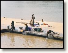The laundry is being done in the Gambia river